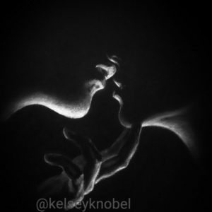 Drawing On Black Paper With White Charcoal